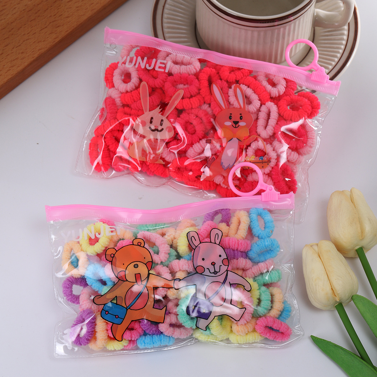 Children's towel ring manufacturer, colorful thumb hair bands that do not damage hair, baby hair tie bags, small rubber band hair ties wholesale Application Scenario