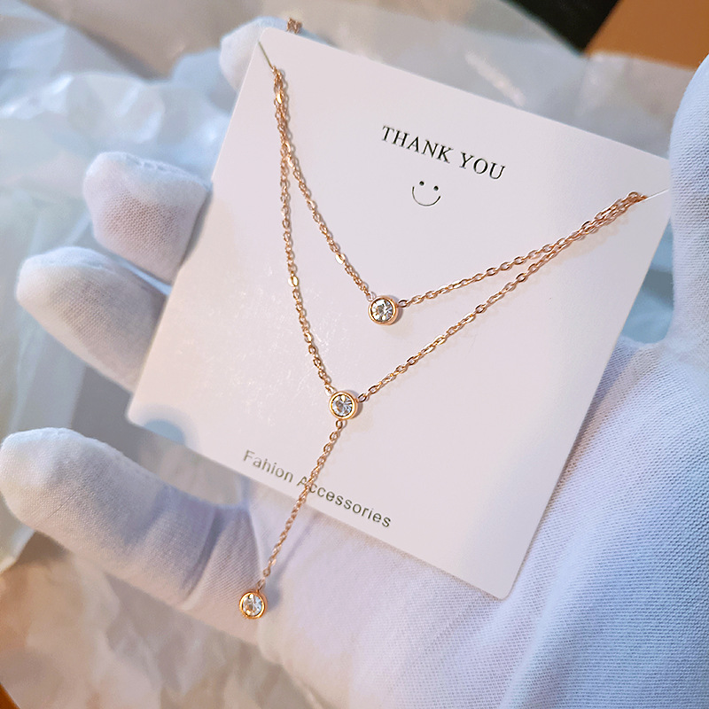 Korean version 18k gold-plated three-tassel double-layer titanium steel necklace, fashionable for women, non-fading, high-end feel, Internet celebrity collarbone chain Application Scenario