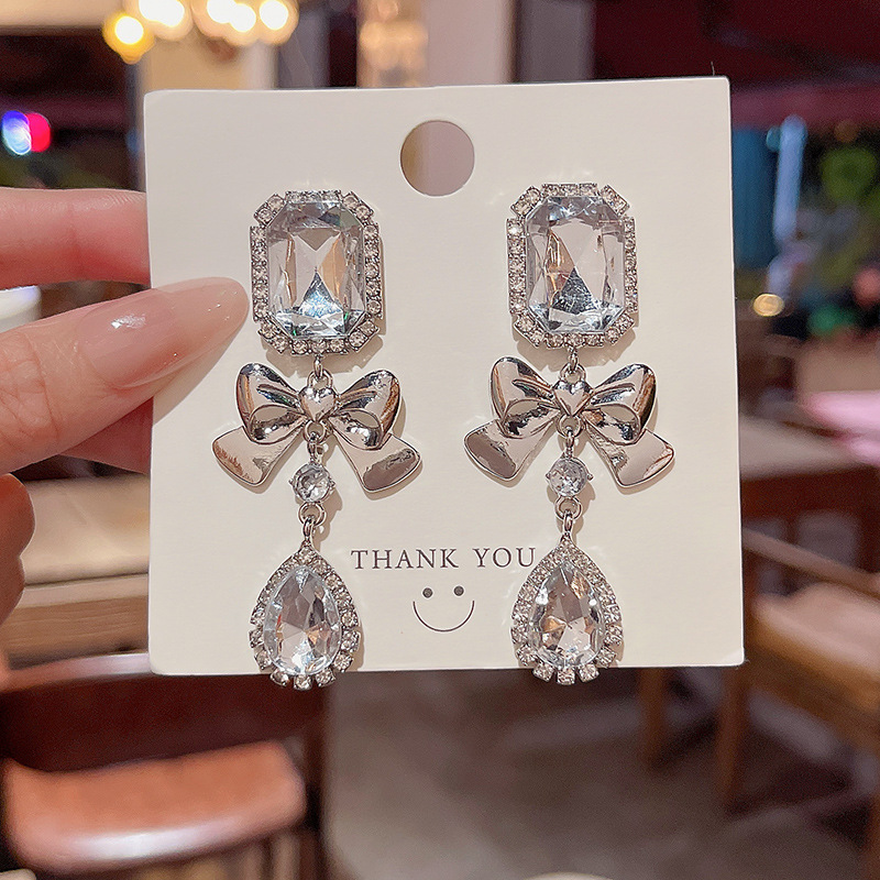 Exaggerated geometric bow-shaped rhinestone earrings, women's light luxury long exquisite stud earrings, high-end and elegant earrings and earrings full figure
