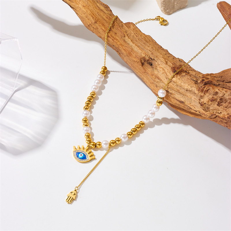 European and American fashion, niche and retro two-color beaded chain, tassel, eye palm pendant necklace details Picture