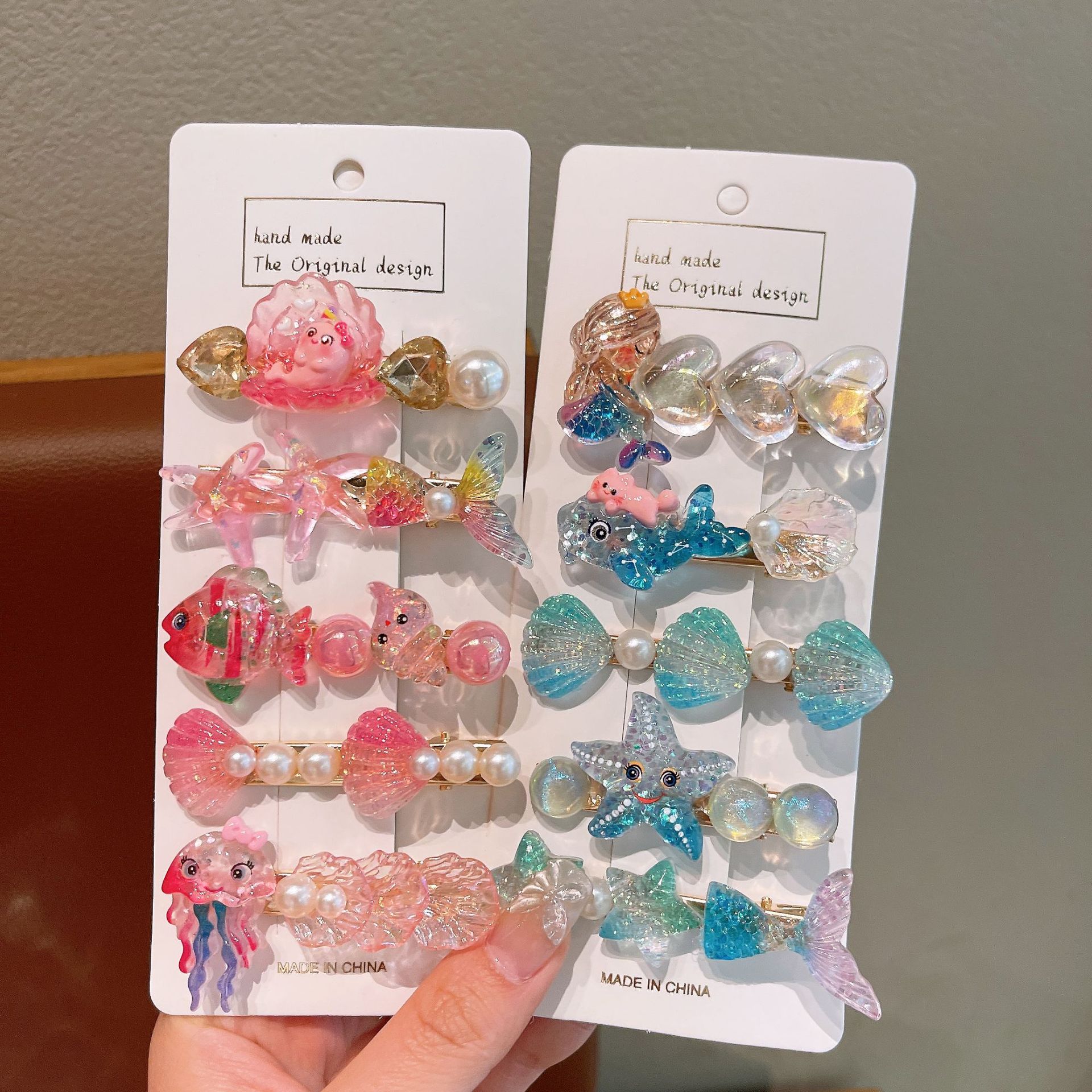 The new children's cute ocean series hair clips, cartoon mermaid, shell and starfish hair accessories will not damage the sides of the baby's hair Application Scenario