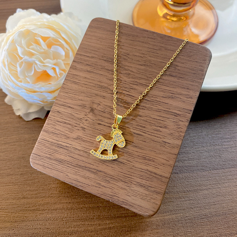 Cute design sense rocking rocking horse necklace, women's fashion, versatile, exquisite zircon collarbone chain, titanium steel jewelry wholesale details Picture