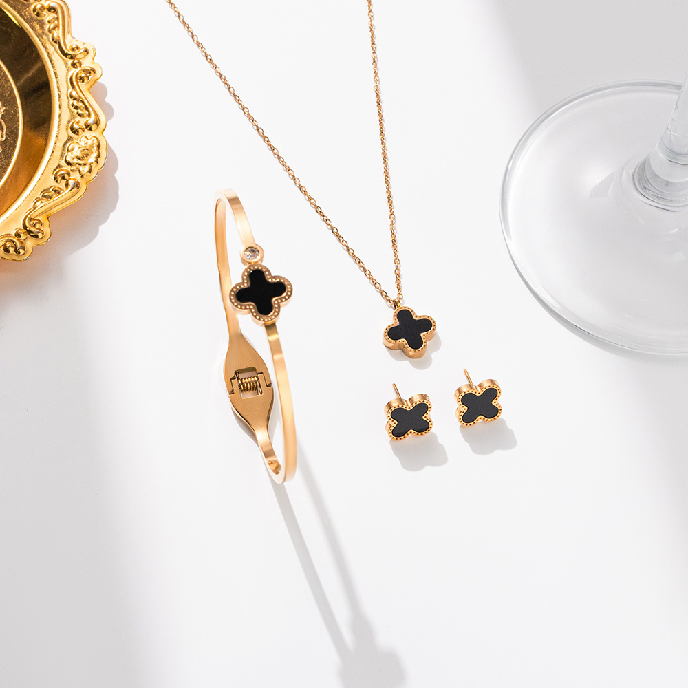 Fashionable and versatile rose gold four-leaf clover necklace, women's stud bracelet, three-piece set of jewelry, titanium steel light luxury accessories details Picture
