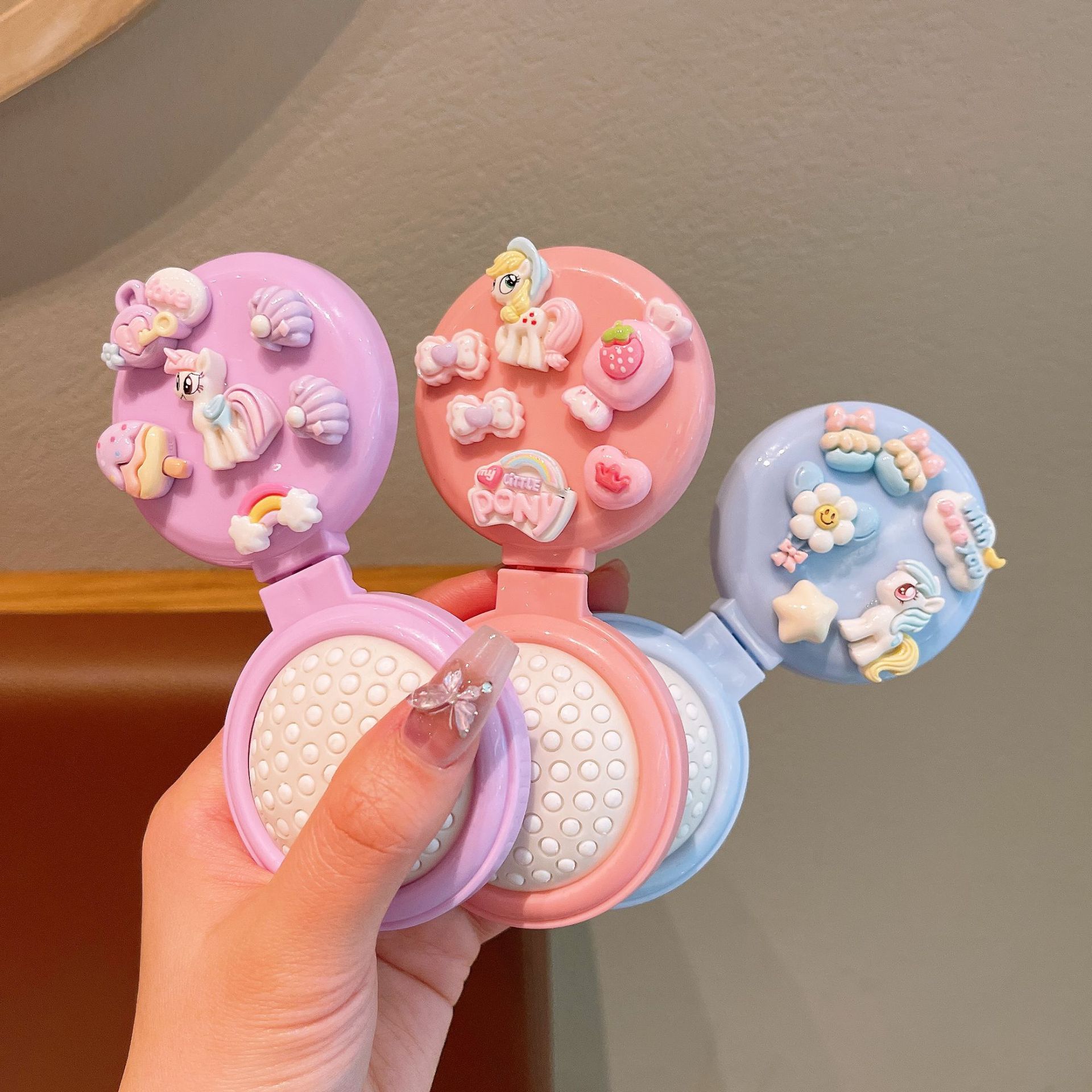 Cute cartoon mini folding comb for girls, portable air cushion comb, airbag massage comb and mirror all in one details Picture