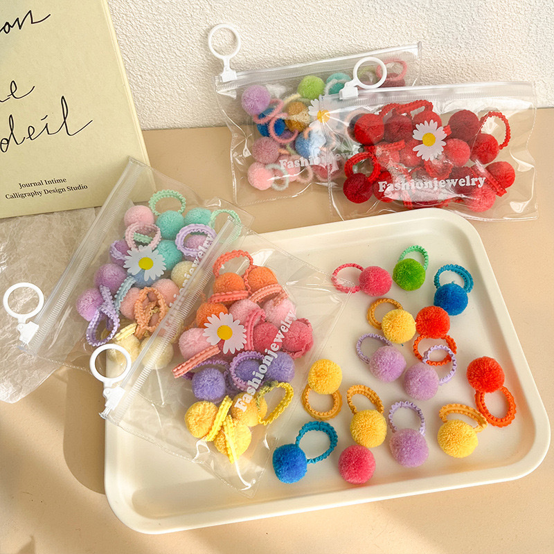 Cute plush hair ties for children in autumn and winter, baby hair ties with elastic bands that won't damage hair, small and colorful pom-pom hair ties details Picture