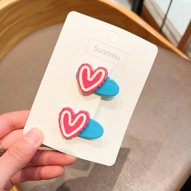 Korean version of girls' hair clips, children's candy-colored flower cartoon clips, small baby bangs, broken hair clips, side duck clips Application Scenario