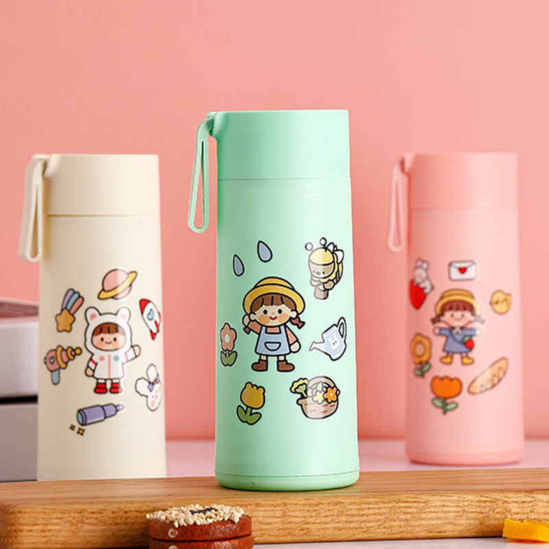 Cartoon glass water cup with a handle, double-layer heat-insulating glass water cup, cute children's portable cup, ground promotion gift cup details Picture