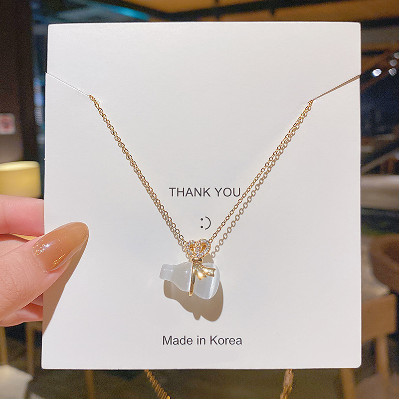 Japanese and Korean light luxury bow, cat's eye stone small gourd necklace, female Instagram personality, high-end style, Internet celebrity collarbone chain neck chain full figure