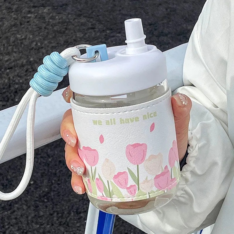 A popular online celebrity girl's glass cup for direct drinking, with a high level of appearance and freshness. It's a portable, heat-insulating leather case water cup gift for female students full figure