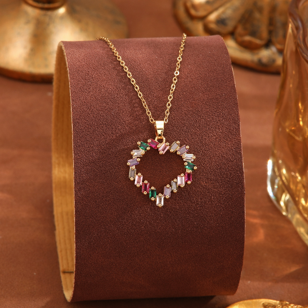 Cross-border European and American titanium steel necklace for women, light luxury and high-end feel, copper micro-inlaid colored zircon heart pendant collarbone chain accessory Specification drawing