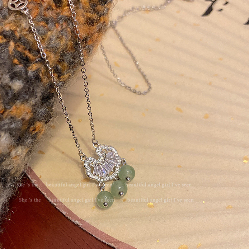 New Chinese-style retro peace lock pendant necklace, women's fashion, niche design sense, versatile, popular collarbone chain accessory Application Scenario