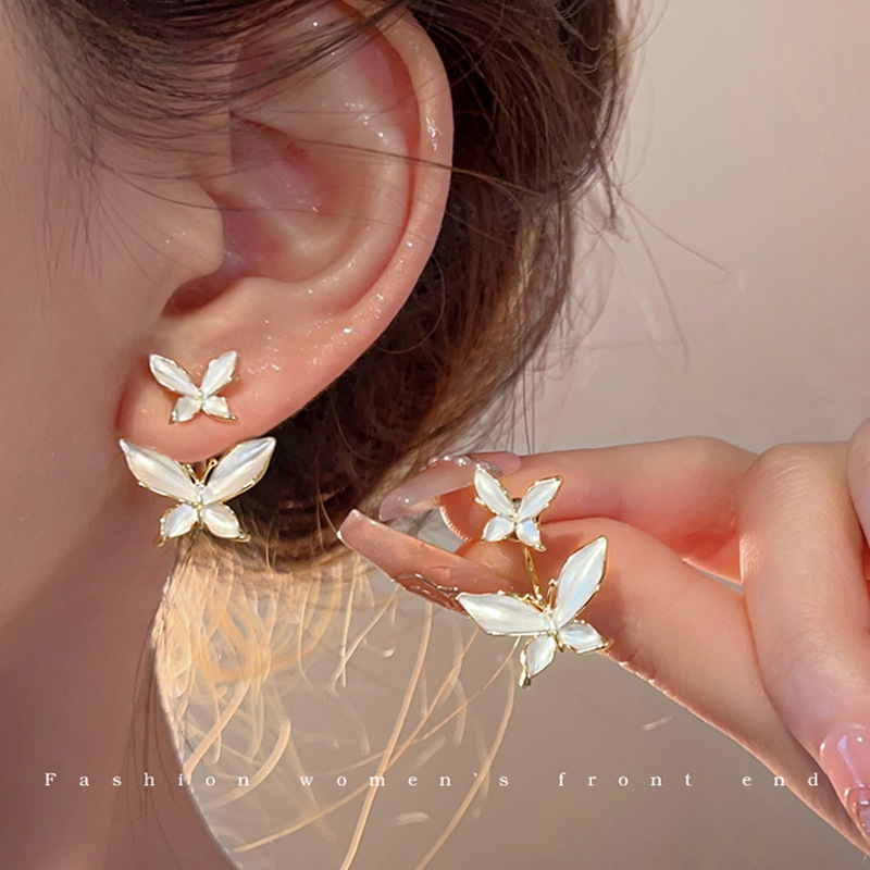 French-style high-end glazed butterfly stud earrings for women, a new 2025 forest-themed gentle and elegant earpiece full figure