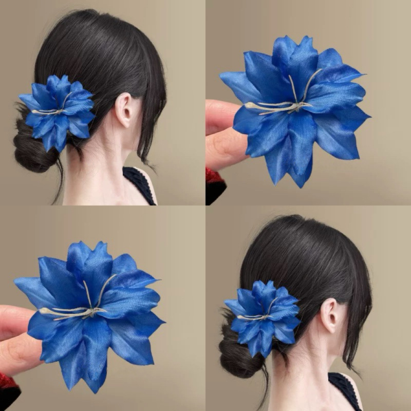 A stylish red faux lily flower fringe with an ins hairpin for taking photos, a high-end and elegant hair accessory and a versatile hair clip Application Scenario