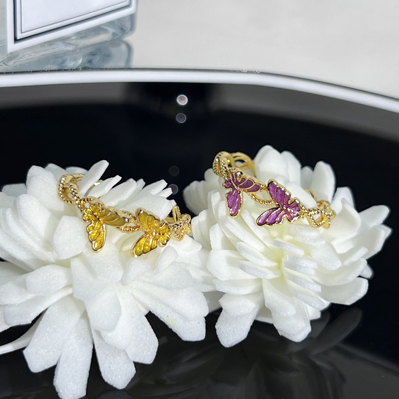A golden double butterfly opening ring with a purple drip glaze for women, featuring a light luxury and niche design, is exquisite and sweet. It is a trendy ring accessory Specification drawing