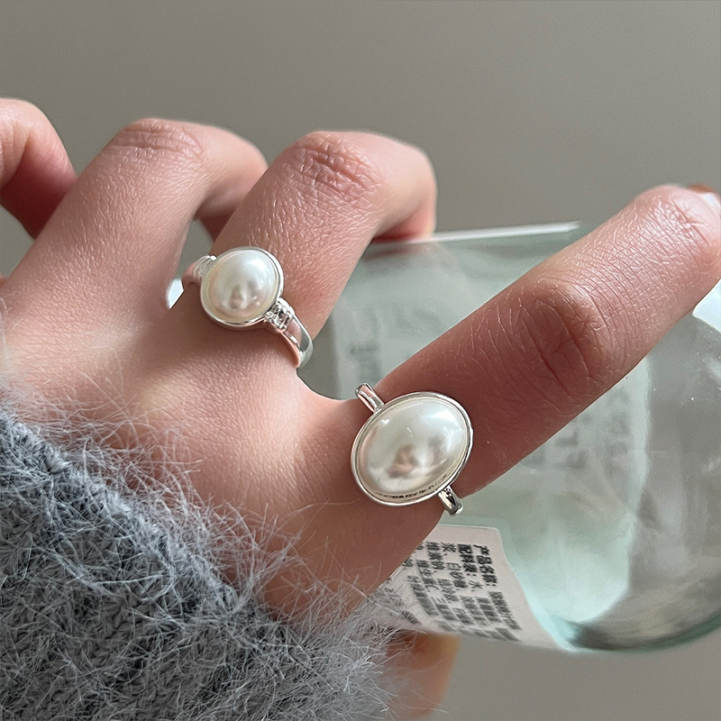 The new 2024 pearl ring for women features a light luxury and niche design. It exudes a sense of sophistication and is adjustable. It's a simple and trendy ring Specification drawing