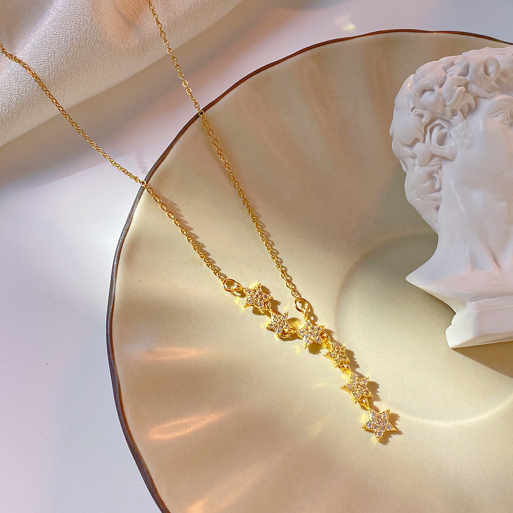 A fashionable and light luxury titanium steel necklace with a starry sky, featuring a niche design for women with tassels and star-shaped collarbone chains, is a trendy and elegant accessory Specification drawing