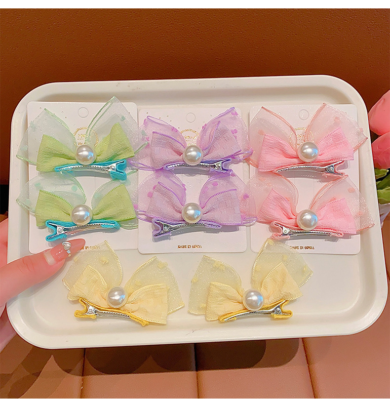 Korean-style pearl three-dimensional bow rabbit ear baby pair clip, fresh and cute bubble gauze children's hair clip, adorable headwear Application Scenario