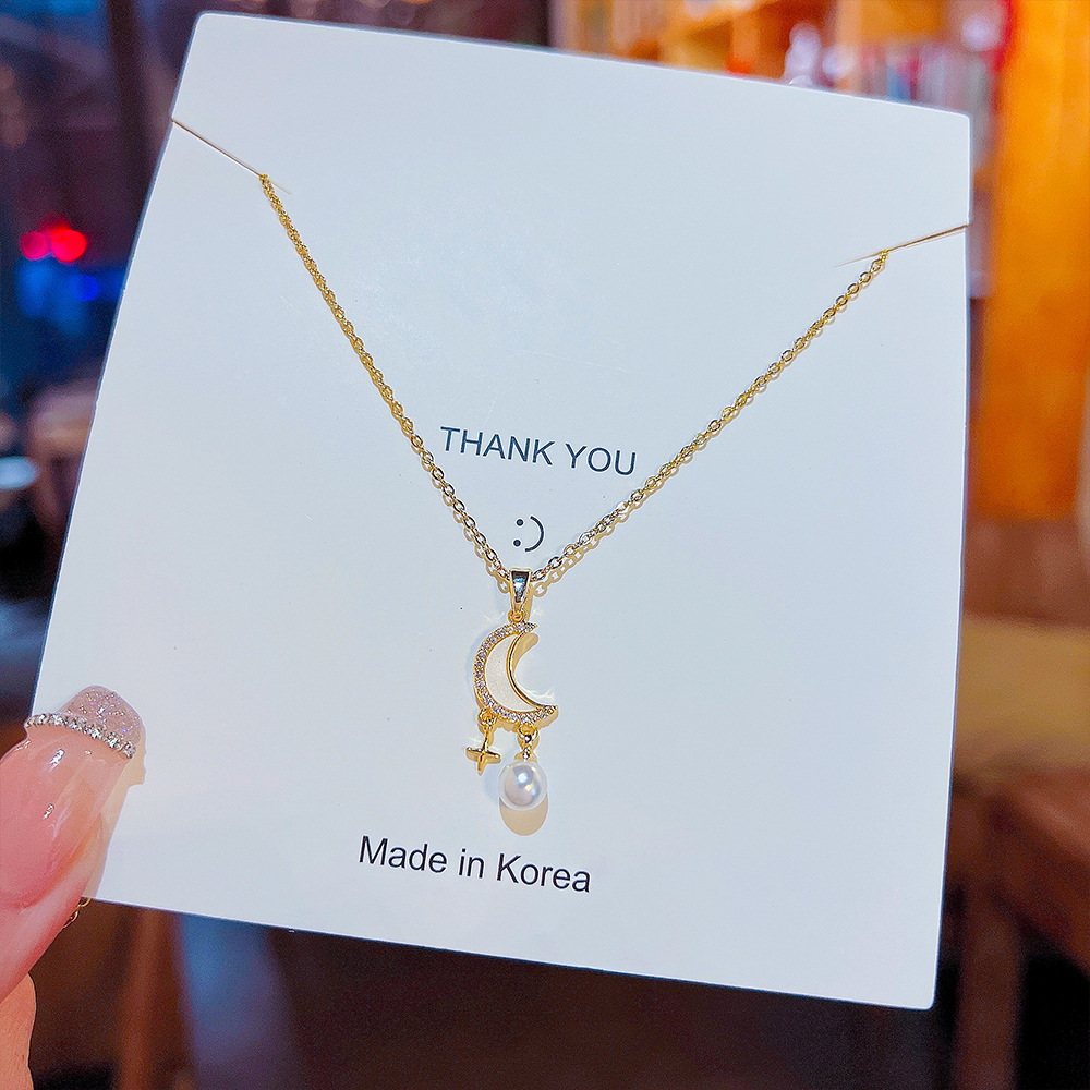 Moon and star pendant, pearl tassel necklace, trendy and luxurious titanium steel collarbone chain for women on Instagram, a popular online accessory Application Scenario