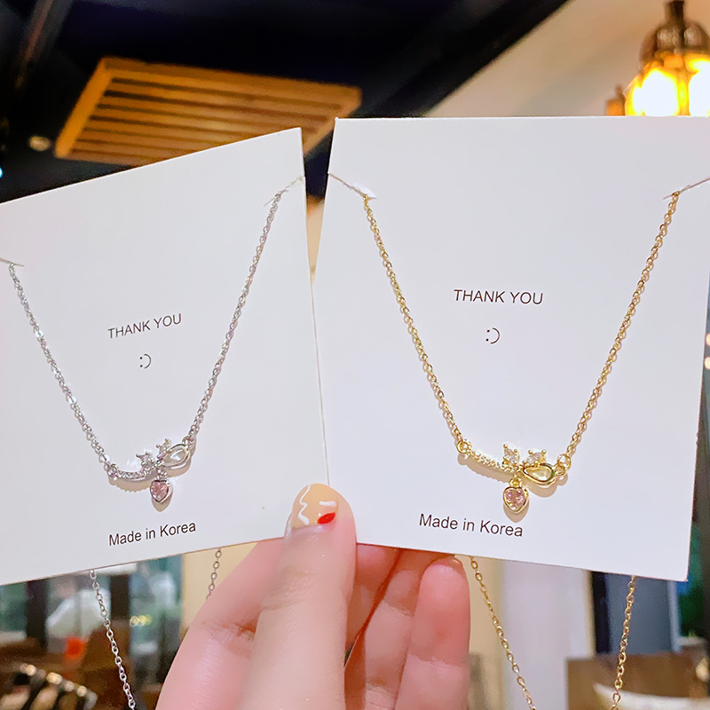 Exquisite and light luxury bow zircon heart titanium steel necklace, a versatile, niche and high-end collarbone chain fashion accessory for women full figure