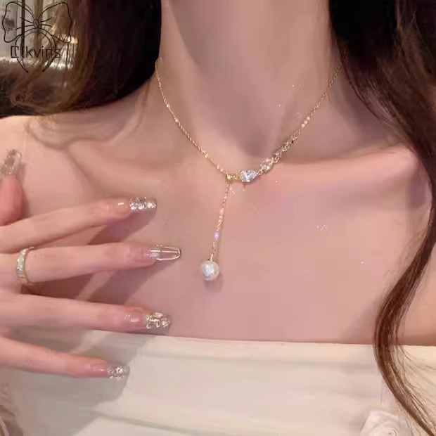 Pearl tassel necklace, a new and popular autumn and winter accessory for women in 2025, is a light luxury and niche collarbone chain with a high-end look full figure