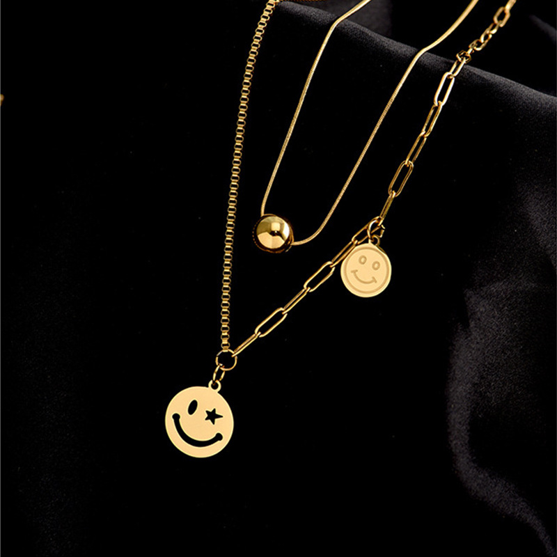 Korean version simple and individual double-layer overlapping round ball beaded expression round pendant titanium steel asymmetrical chain necklace Application Scenario