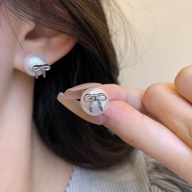 S925 Silver needle bow pearl Stud earrings for women, light luxury, versatile, elegant, high-end and grand autumn and winter earrings wholesale details Picture
