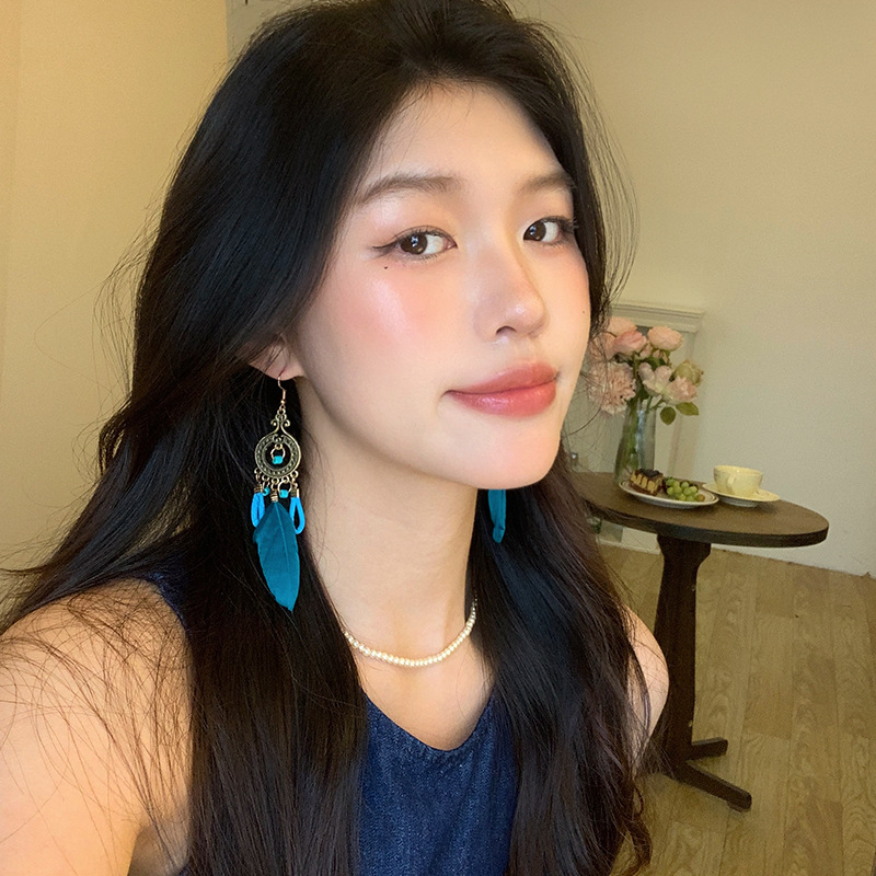 Bohemian ethnic style retro feather ear hook women's high-end and elegant long earrings, wholesale of popular earrings details Picture