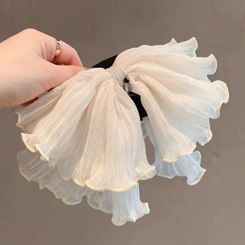 A new, ethereal and gentle double-layer mesh ponytail clip with a forest-themed sweet and high-end pearl pleated grab clip hair accessory for women full figure