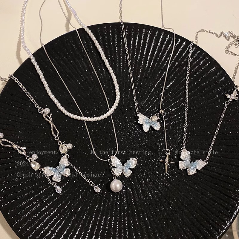 Ice crystal gradient pearl butterfly tassel necklace, a summer bestseller for women, with a high-end collarbone chain and a sweet and cool style neckchain accessory Application Scenario