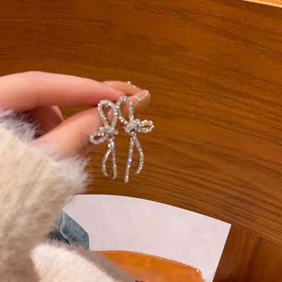 Diamond-encrusted zircon bow stud earrings for women, a unique, light luxury and high-end look, a popular online celebrity earrings wholesale in 2024 thumbnail