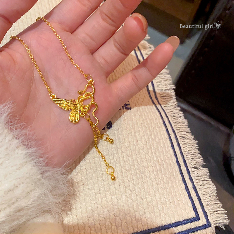 New Chinese-style snake entwined butterfly pendant necklace, a high-end and light luxury accessory for women's zodiac year, collarbone chain, sweater chain full figure