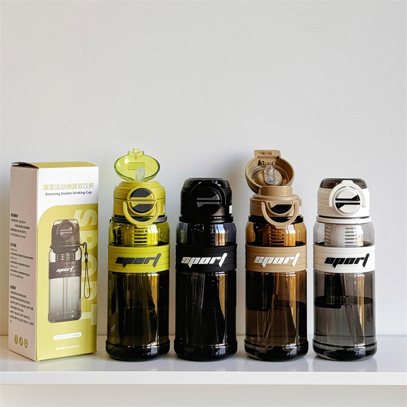 Wholesale of portable large-capacity sports water cups with straws, direct drinking cups for students going to school in summer, and plastic cups for separating tea and water full figure