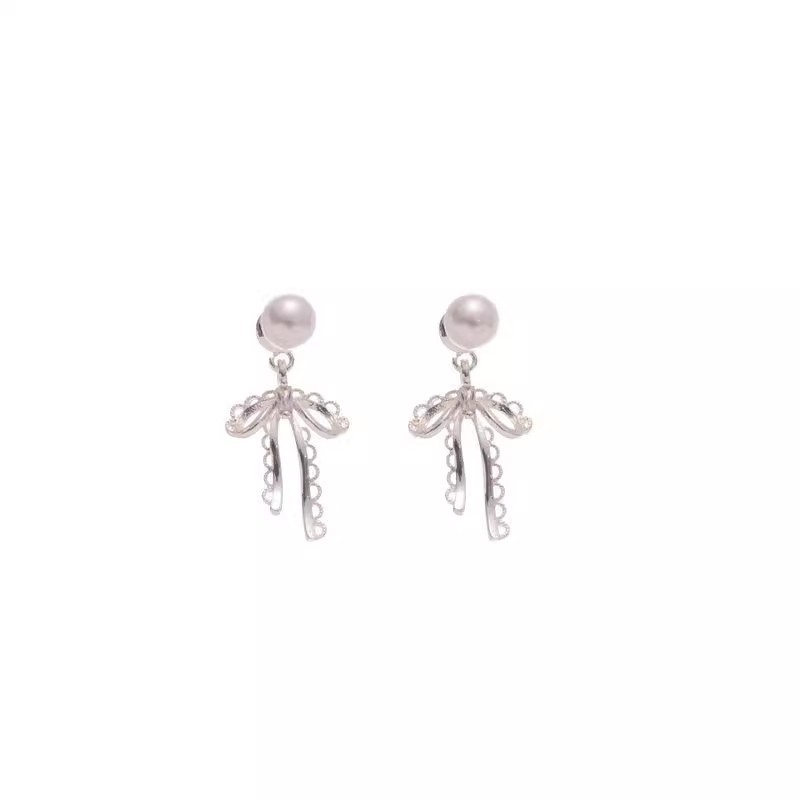 Exquisite bow imitation pearl earrings for women, light luxury, niche and high-end style earrings, 2025 new trendy earrings wholesale Item Picture