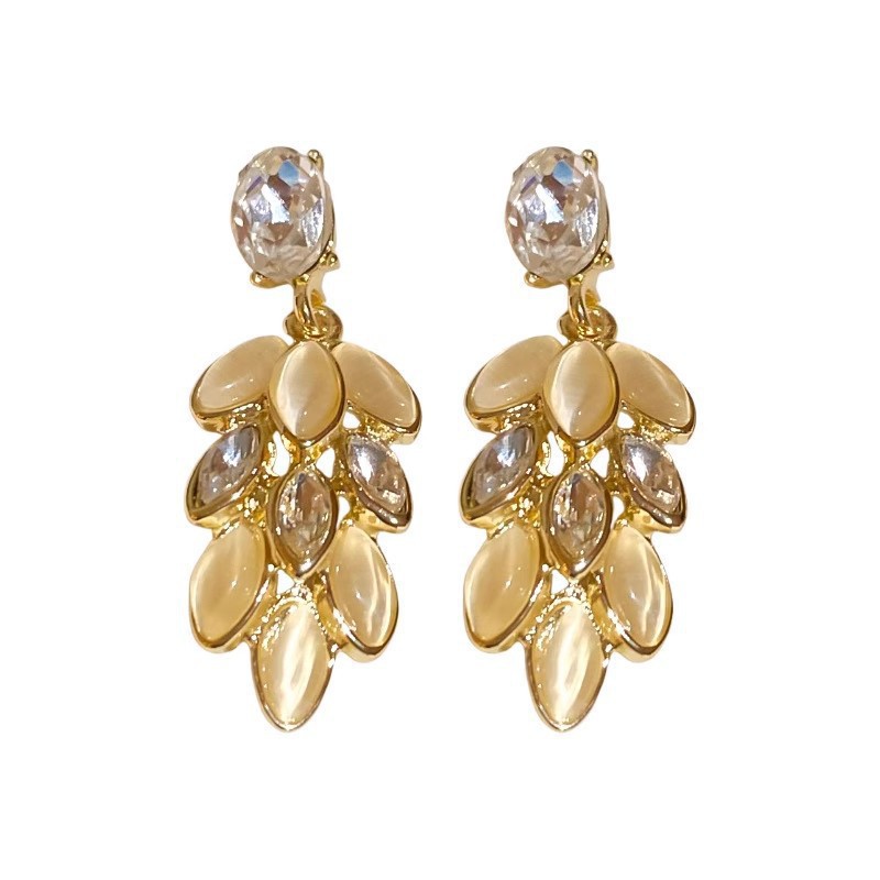 Light luxury and high-end style, zirconium flower tassel stud earrings, unique female personality, Korean-style fashionable cat's eye stone earrings Item Picture