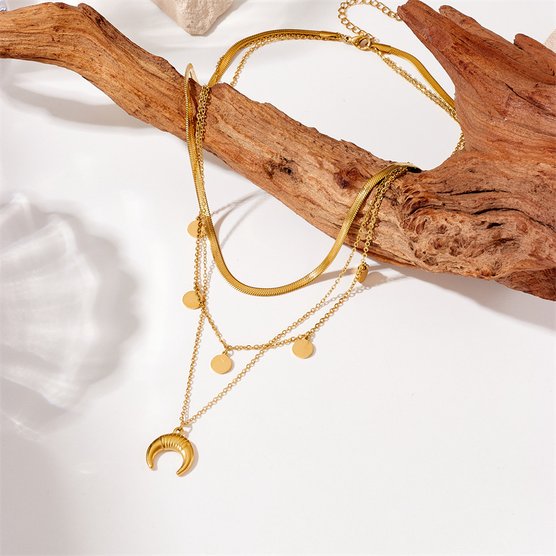 A retro and high-end European and American niche style, gold-plated titanium steel round plate moon accessory, multi-layer layered wearing jewelry necklace details Picture