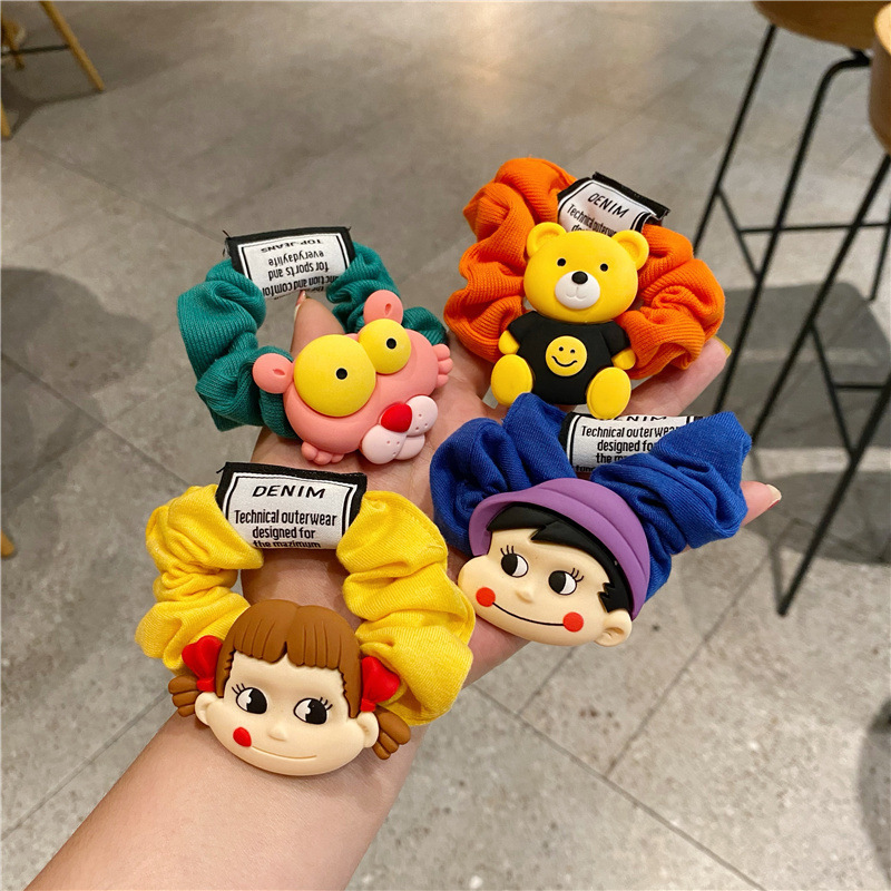 Korean version colorful fabric cartoon smiling face hair band, cute girl hair tie, children and adults' hair, flower girl hair tie, rubber band Application Scenario