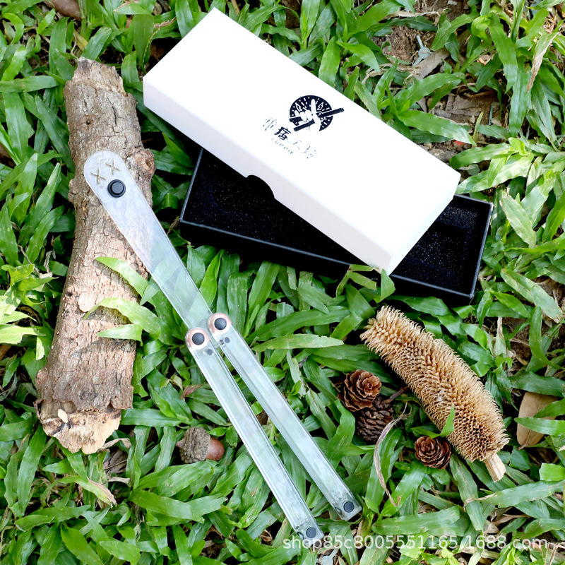 Yapi Workshop Transparent Butterfly Knife, uncut Training Knife, Folding knife, Swinging Knife, Plastic pc Squid, Smiling Clown Application Scenario