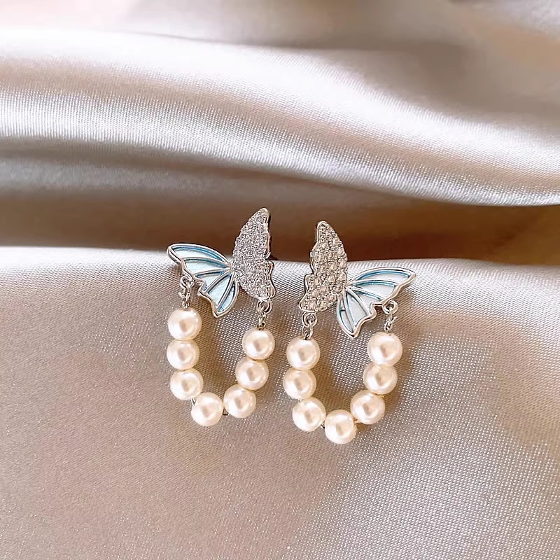 Blue micro-inlaid butterfly pearl stud earrings for women, 2025 new style earrings, niche design sense, unique tassel earrings full figure