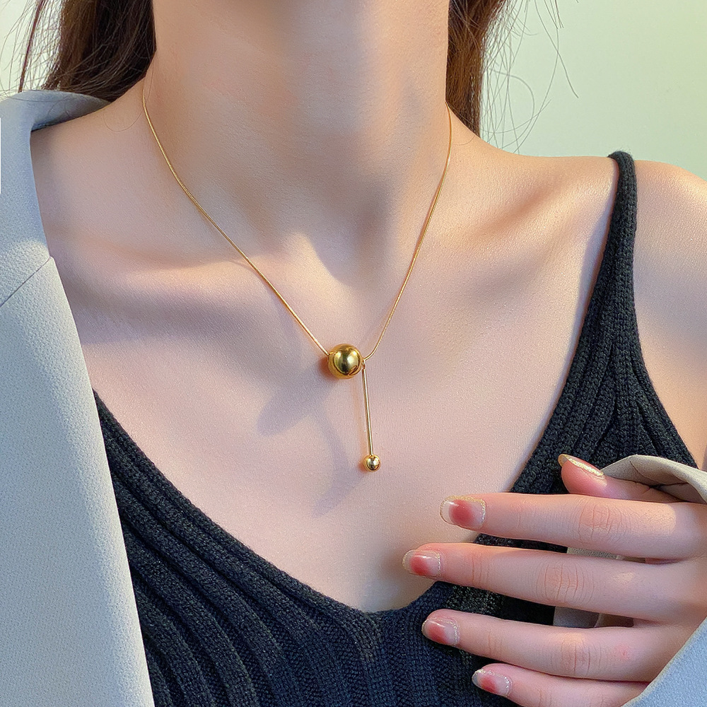 Minimalist ins metal round ball long sweater chain, non-fading titanium steel necklace, versatile tassel snake bone chain for women's personality Specification drawing