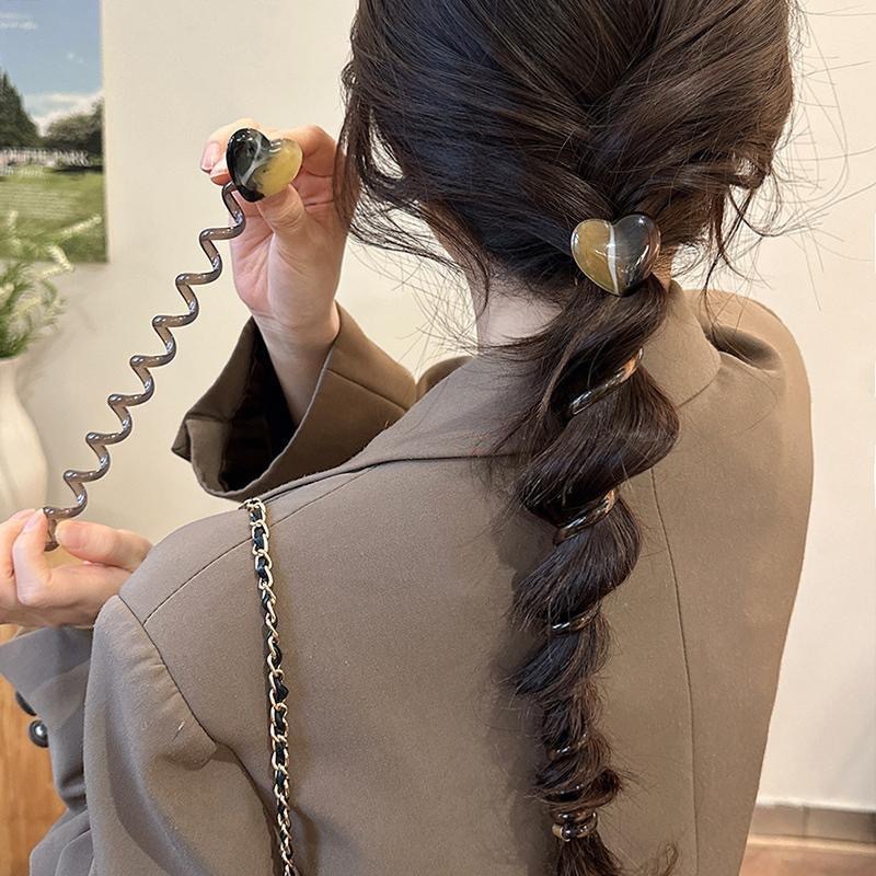 Heart-shaped Korean-style straight telephone line hair tie, ponytail hair, hair band bubble braiding, simple, elegant and durable hair cord Application Scenario