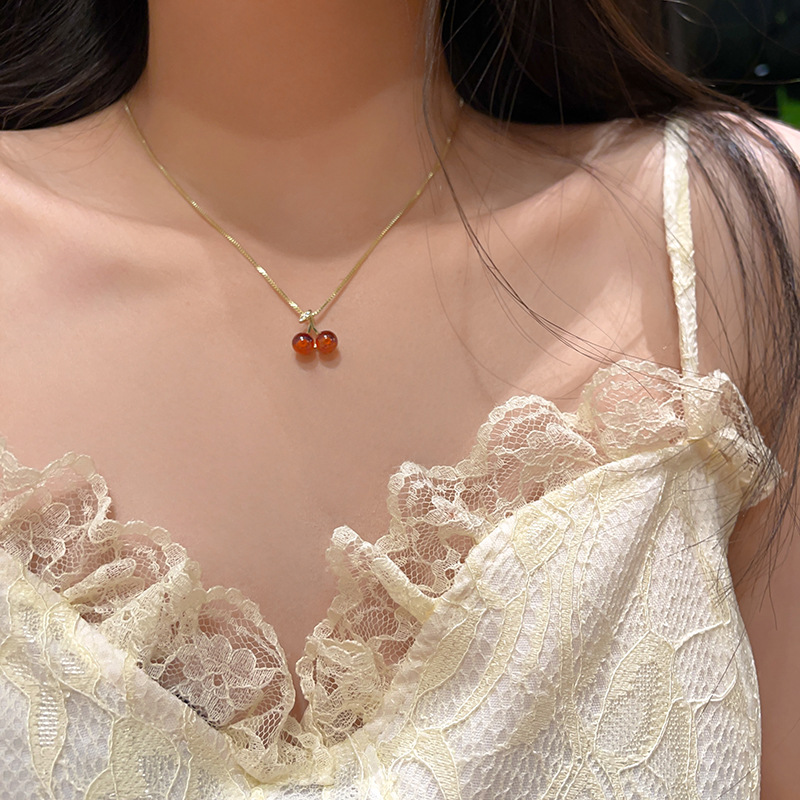 Wholesale of the new red cherry pendant necklace from South Korea, featuring a light luxury style for women, a niche charm, versatile and high-end collarbone chain Application Scenario