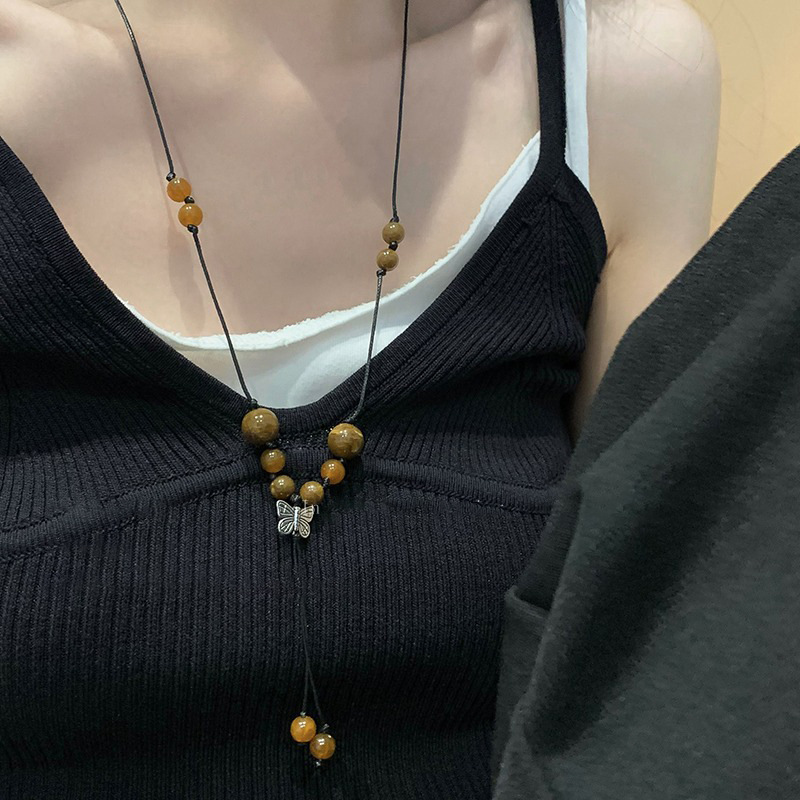 Retro butterfly braided rope necklace, 2023 new style women's sweater chain design, niche collarbone chain accessory details Picture