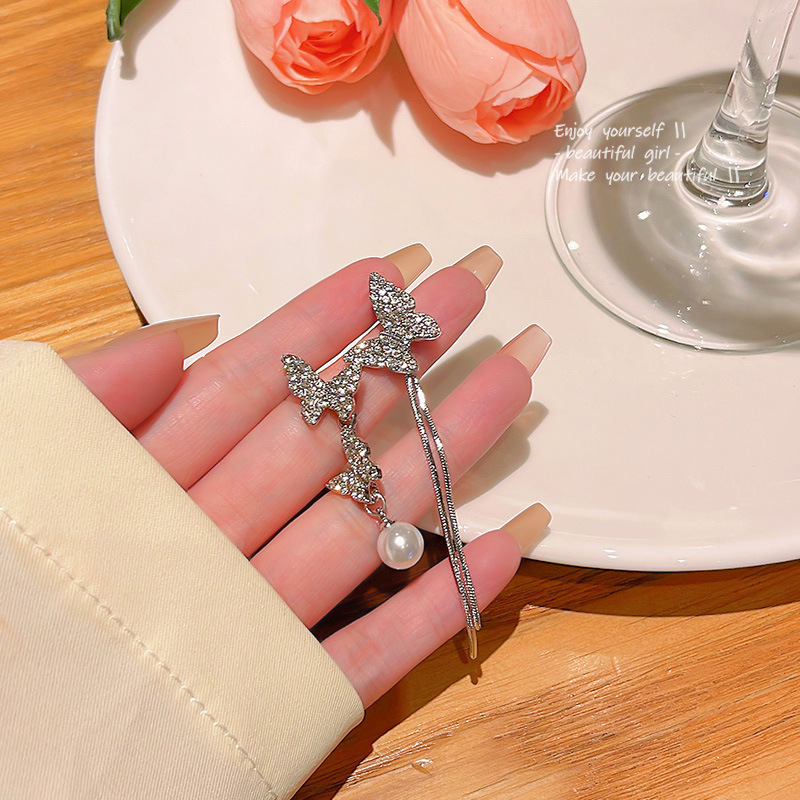 S925 Silver Needle asymmetrical butterfly Pearl Earrings, a French high-end women's diamond-encrusted tassel bestseller stud earrings full figure