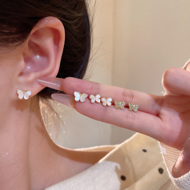 Wholesale of Korean diamond-encrusted mother-of-pearl butterfly ear studs for women, a light luxury, niche and high-end ear-piercing six-piece set of earrings and earrings details Picture