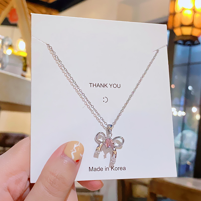 A light and luxurious pink bow titanium steel necklace, a fashionable and niche design for women, a popular collarbone accessory with a high-end feel Specification drawing