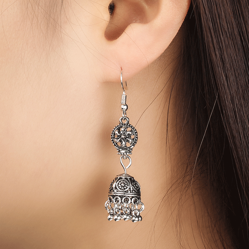 Popular earrings in tourist attractions: European and American retro ethnic style Baroque hollowed-out carved bell tassel earrings full figure