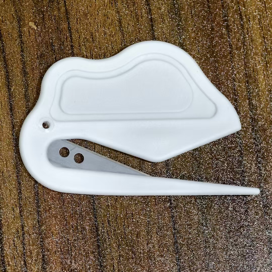Cross-border multi-functional plastic mini box opening knife, rope cutting and sealing, express packaging film opening knife, portable box opening knife undefined