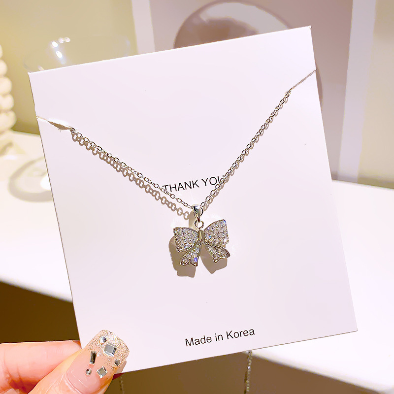Korean style, elegant and high-end, silver full diamond bow necklace, women's fashion, versatile, Internet celebrity collarbone chain accessory wholesale Application Scenario