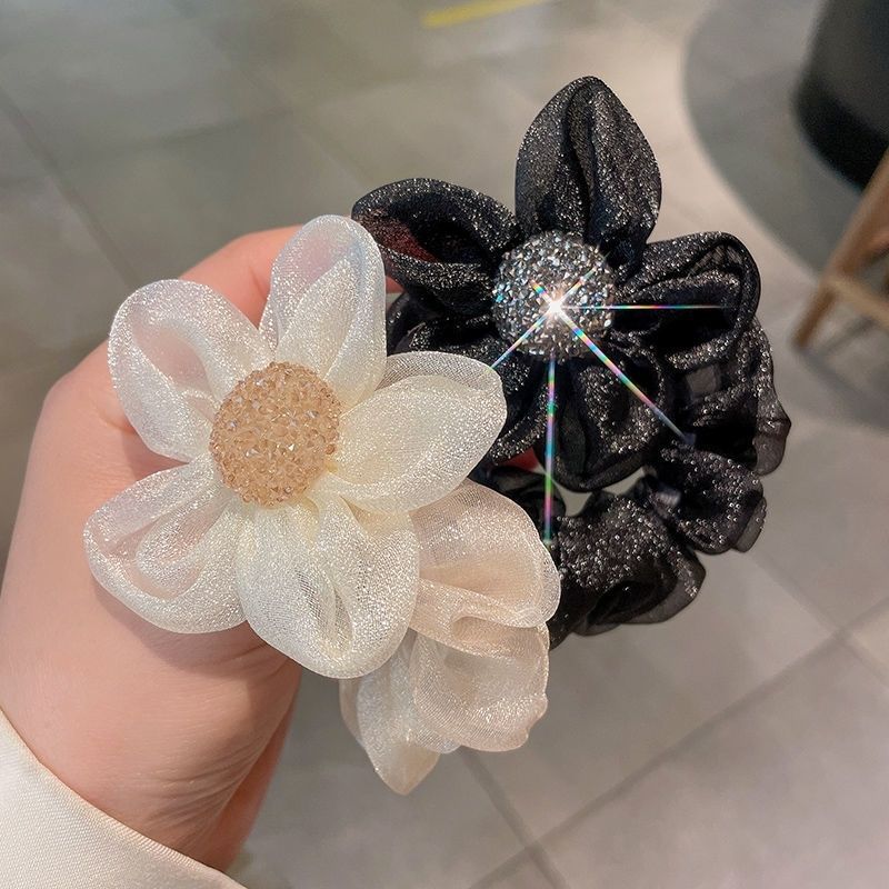 Two light luxury mesh fabric knotted hair accessories, shiny water diamonds, sun and flower hair bands, ponytail hair ties, and bun hairstyle details Picture