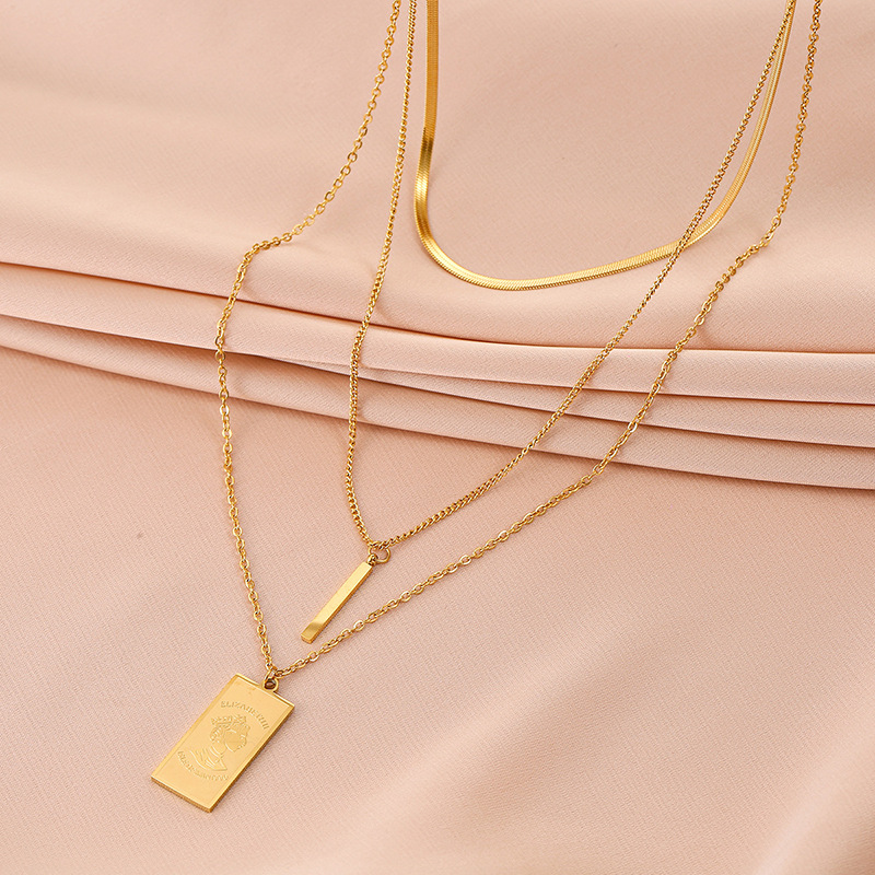An irregular, simple and versatile titanium steel pendant necklace featuring a long and square queen's head in European and American fashion Specification drawing